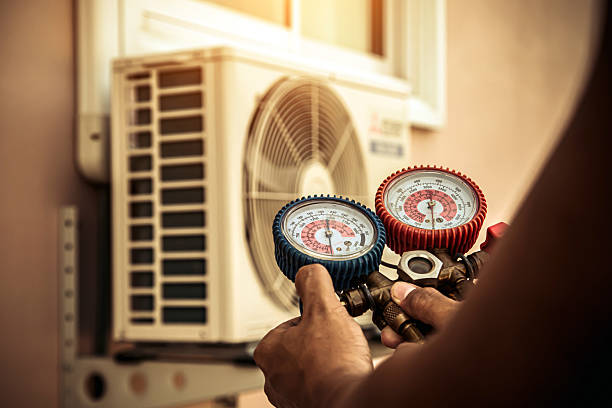 Professional Air Conditioning Service technician working in Woodbury, KY